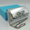 POCHETTE ARGENTO CON FIOCCO STRASS