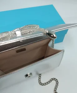 POCHETTE ARGENTO CON FIOCCO STRASS