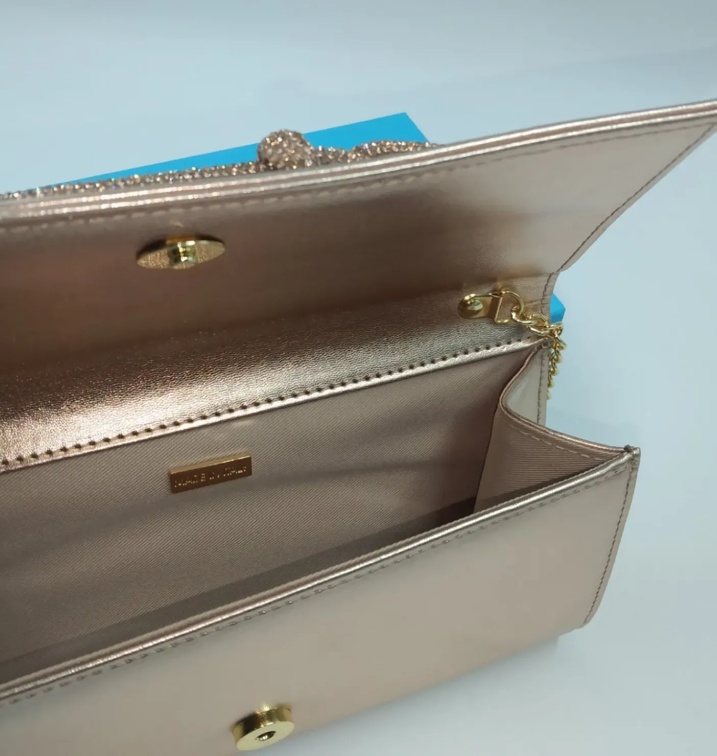 POCHETTE RAME CON DETTAGLI STRASS