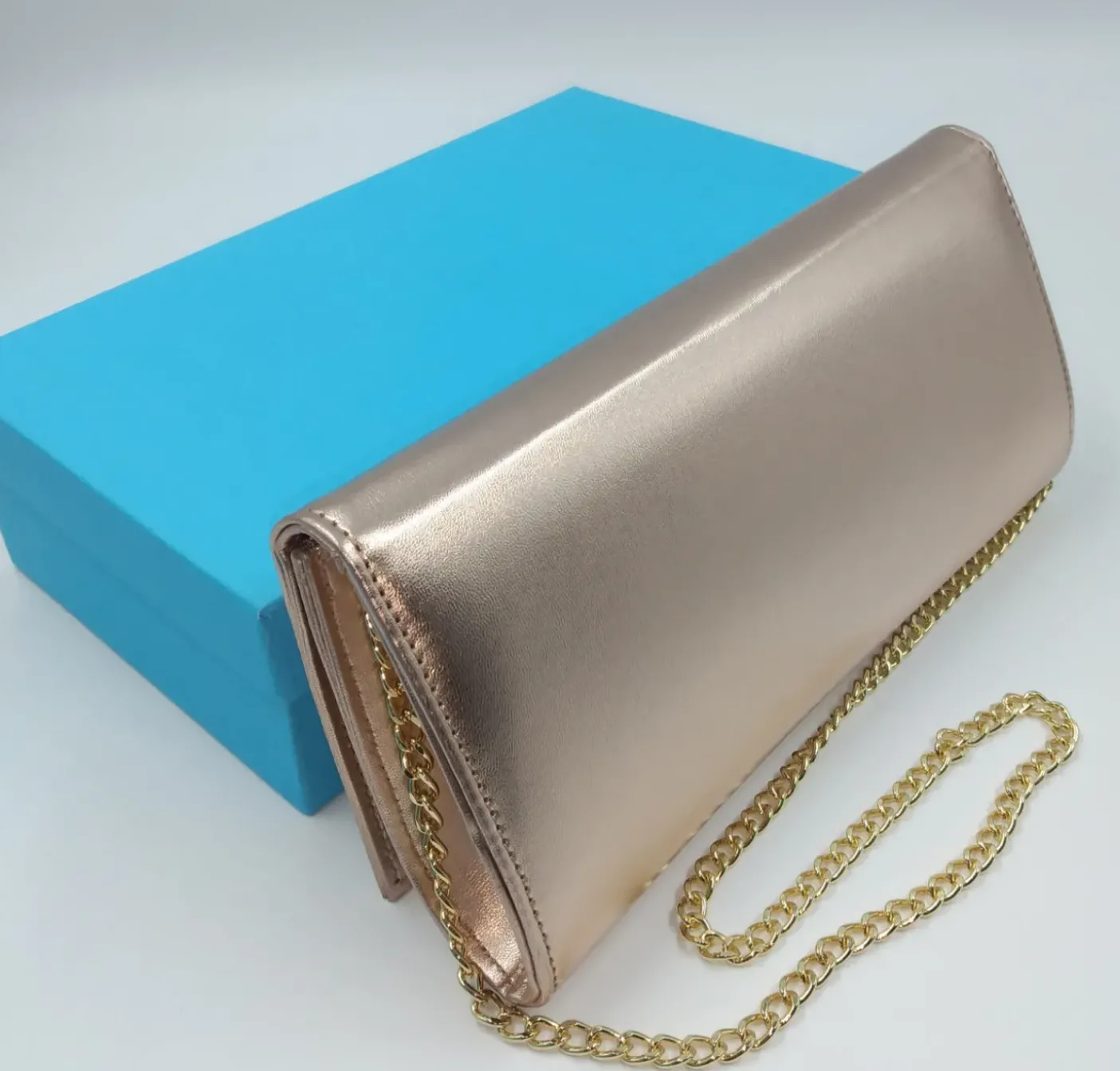 POCHETTE RAME CON DETTAGLI STRASS