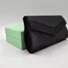 POCHETTE TESSUTO NERO DETTAGLIO LUX