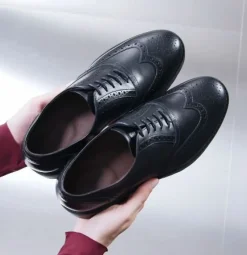 STRINGATE FRANCESINE PELLE NERA