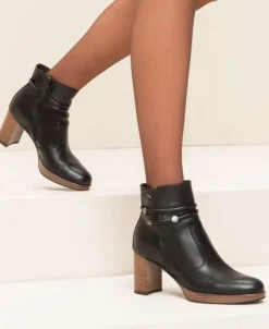 TRONCHETTI PELLE NERA APPLICAZIONI